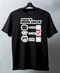 Black t-shirt with 'Today's Mood Check' graphic on a hanger against a gray background