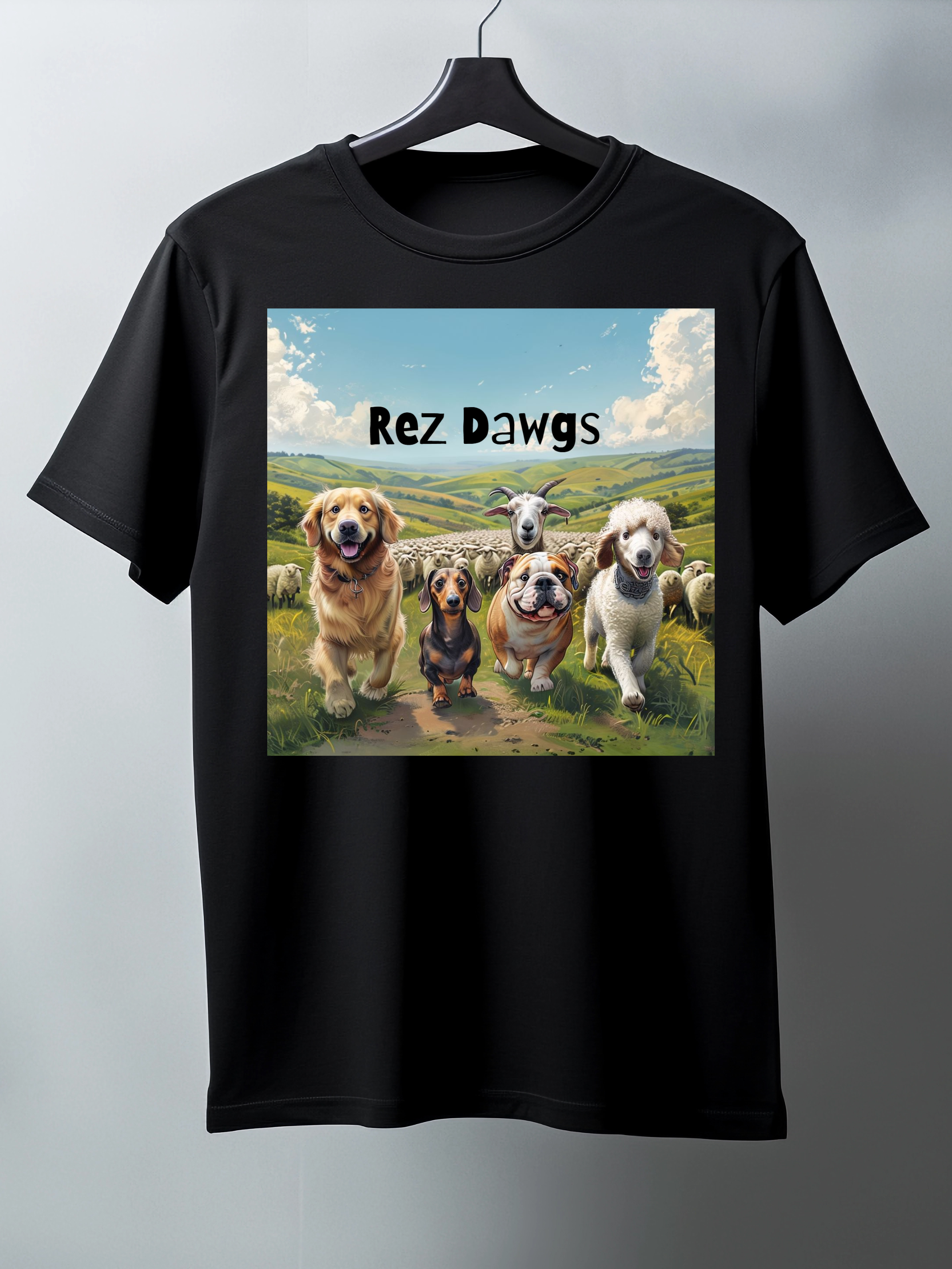 Black t-shirt with a graphic of dogs and 'Rez Dawgs' text on a hanger against a gray background